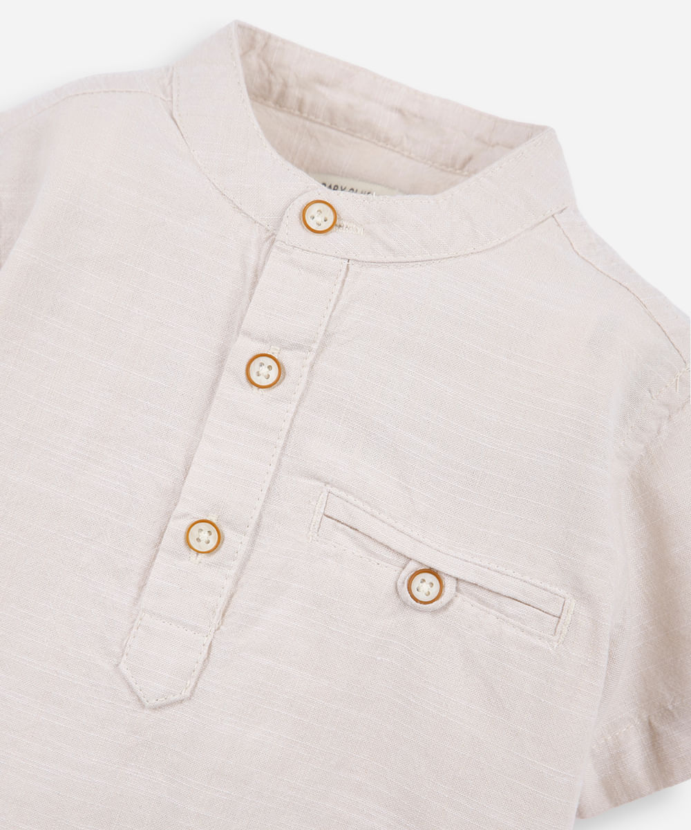 camisa infantil manga curta gola padre com bolso bege