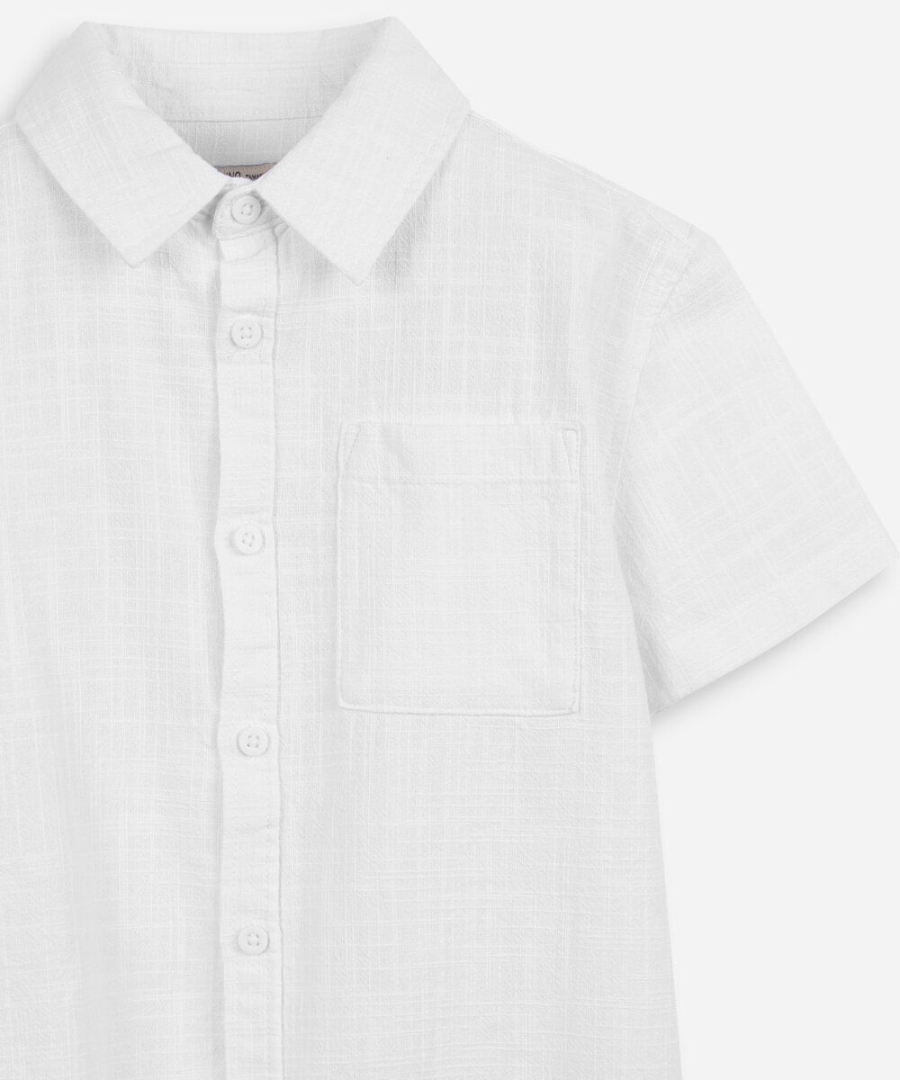 camisa infantil de algodão texturizada com bolso branco
