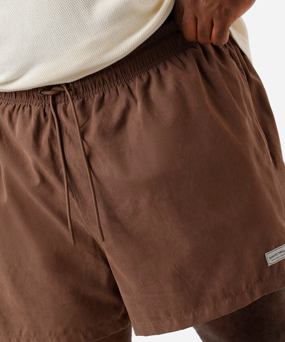 short masculino de poliamida plus size marrom