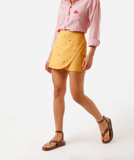 short saia feminino com linho e bordado floral amarelo