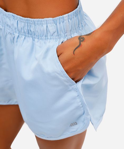 short running feminino com bolso esportivo azul
