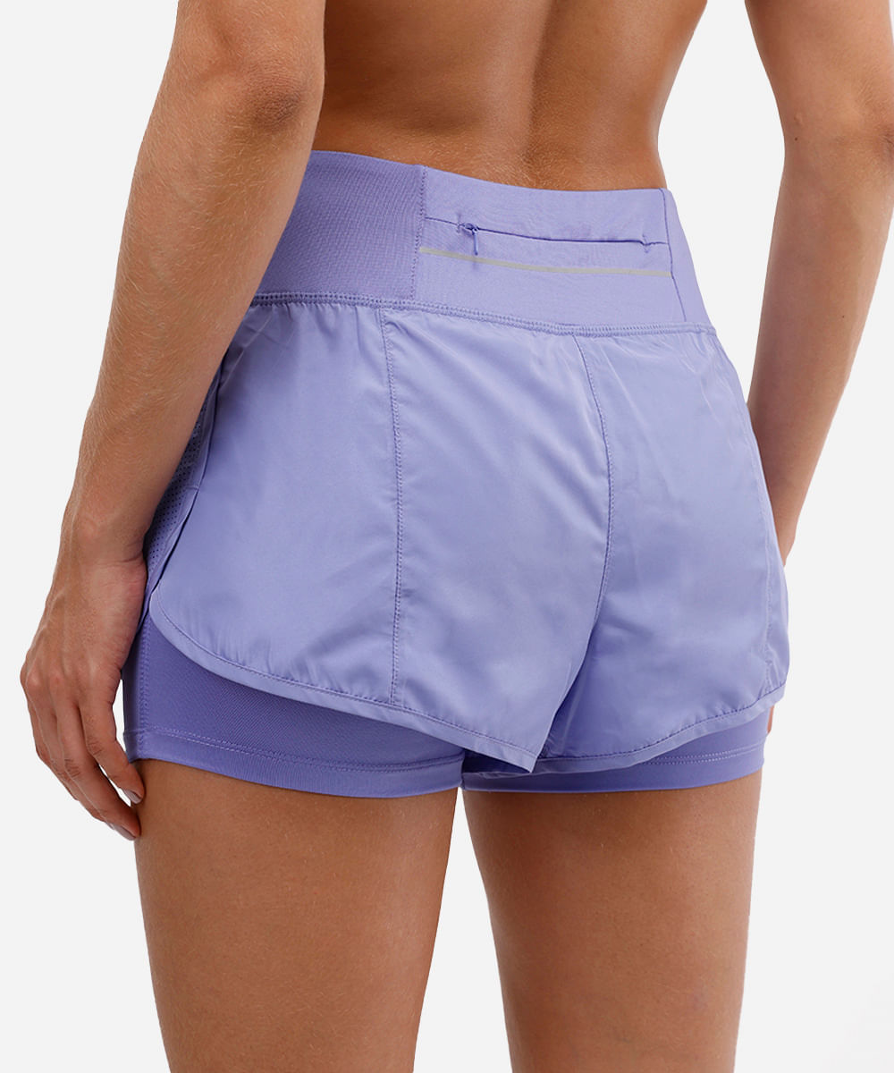short running com forro e bolso esportivo ace lilás