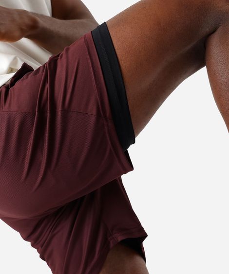 short masculino esportivo com bermuda interna texturizado vinho