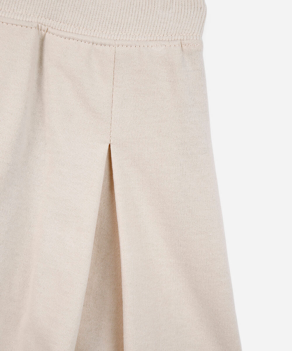 short saia de moletinho infantil plissado off white