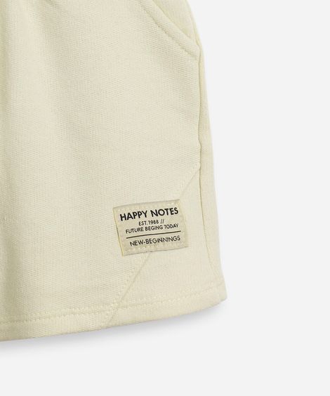 short infantil com recortes verde