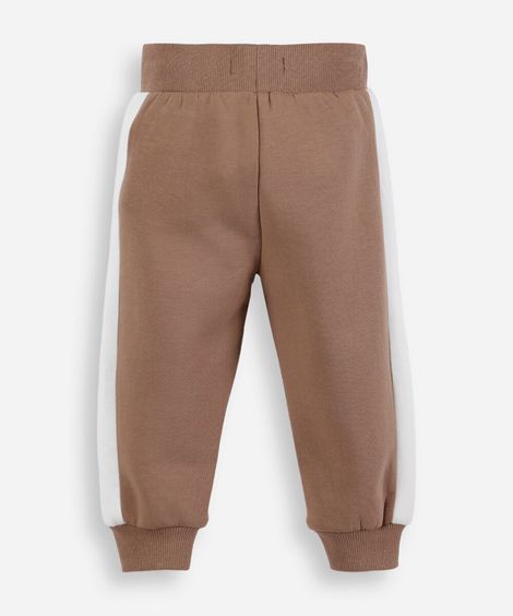 calça jogger infantil de moletom com recortes bege