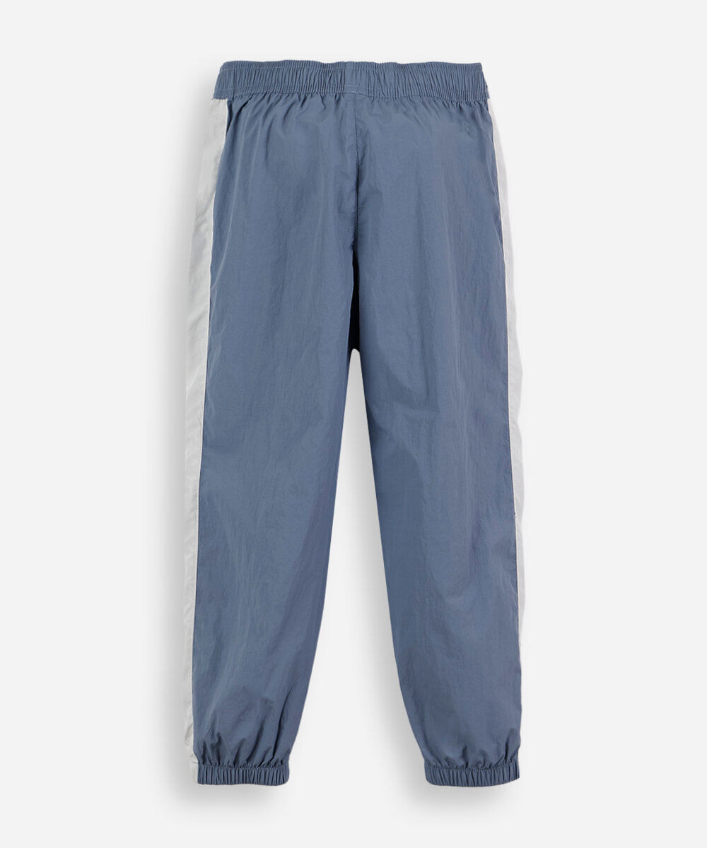 calça jogger esportiva infantil de poliamida com recortes azul