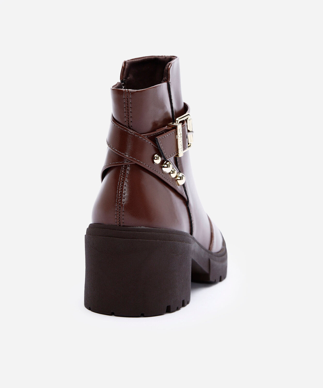bota tratorada com cano curto e fivela marrom
