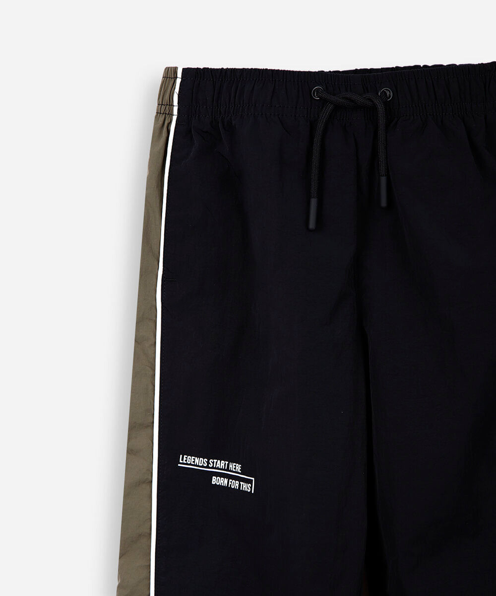 calça jogger esportiva infantil de poliamida com recortes preta