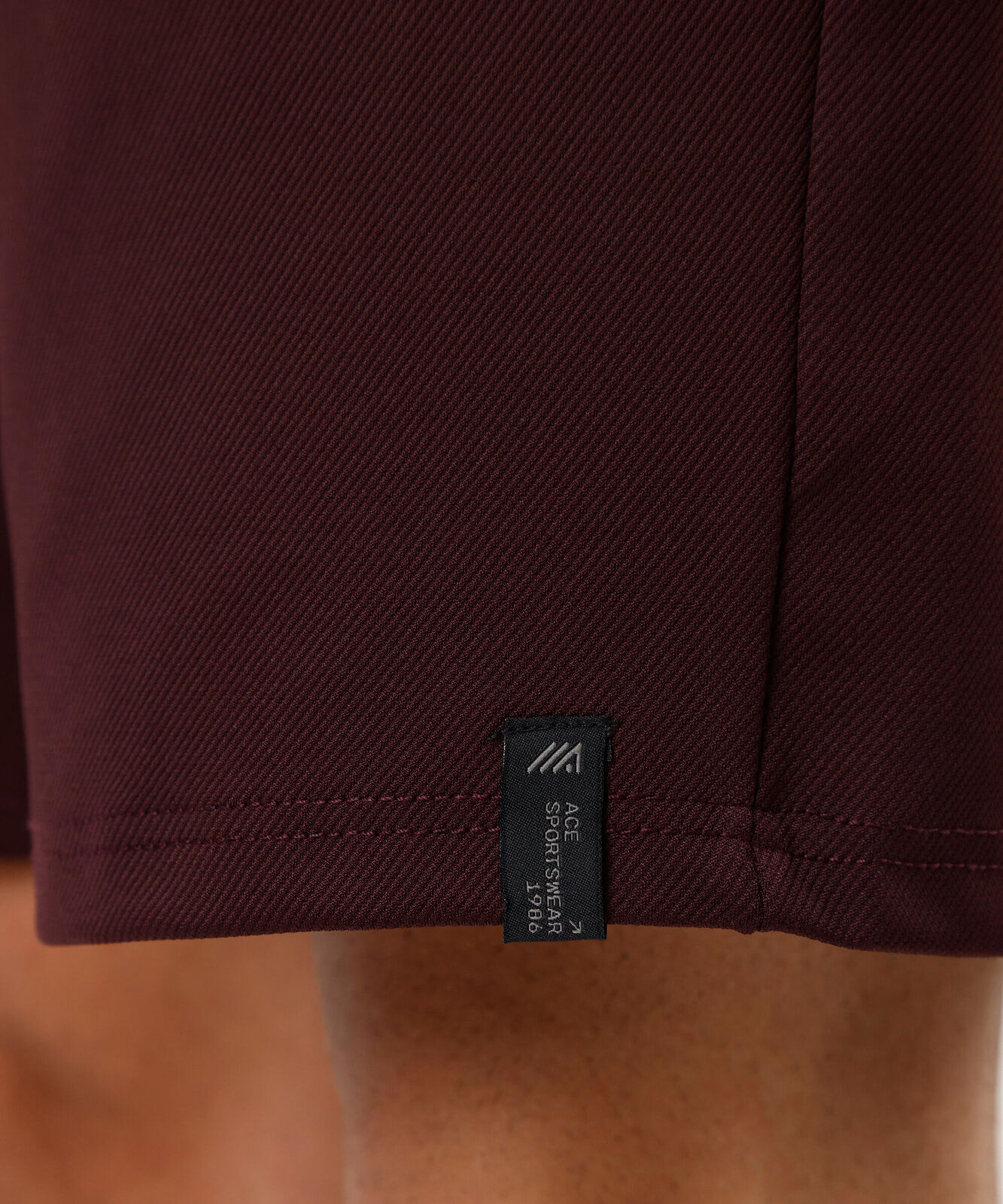 short cós com elástico texturizado esportivo vinho