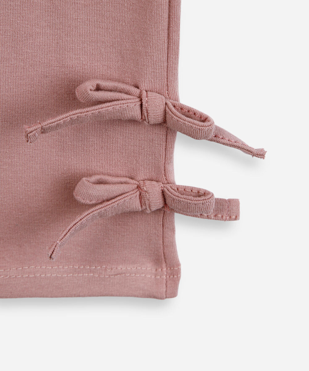 calça legging infantil com lacinhos na barra rosa
