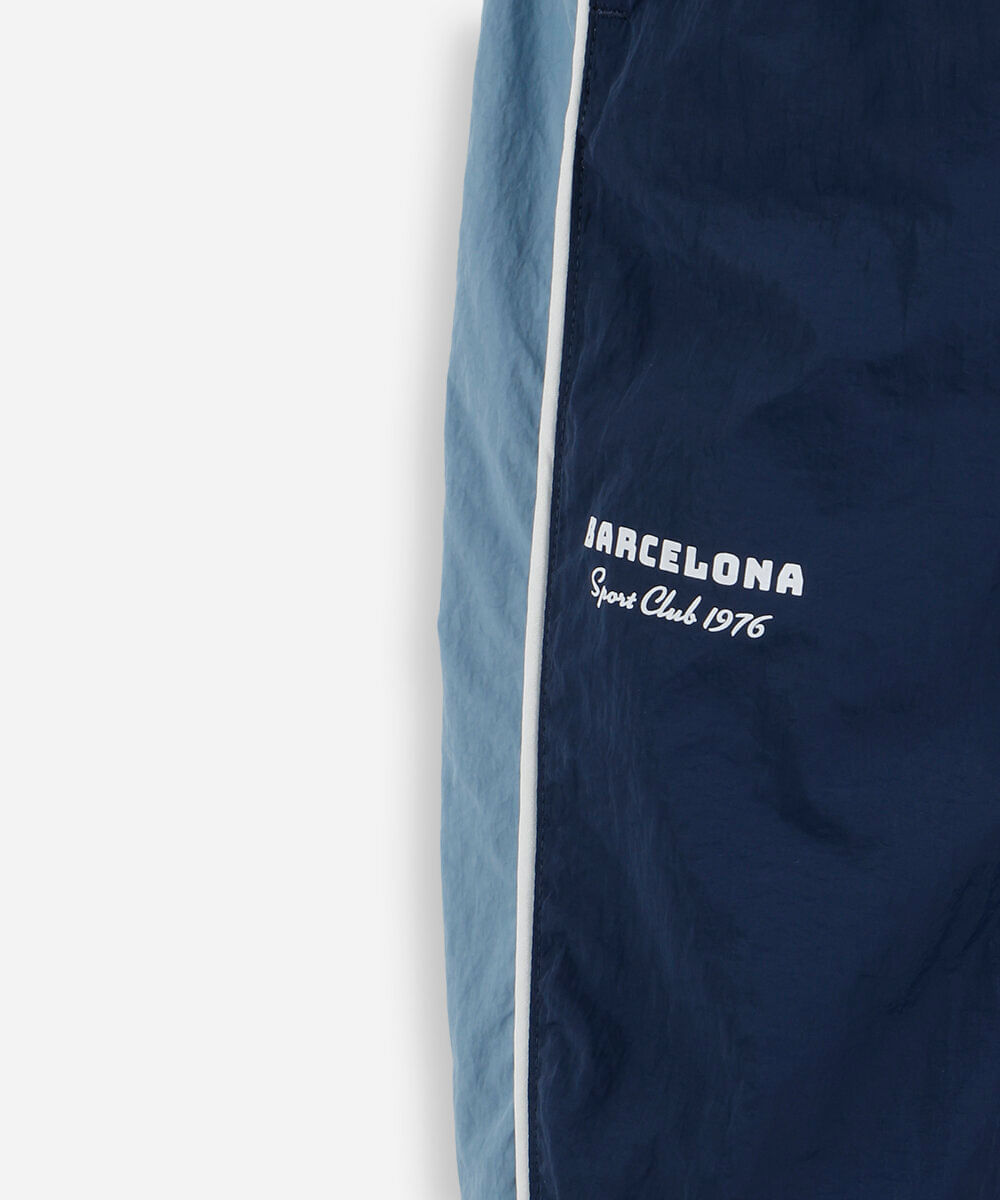 calça infantil esportiva jogger com recorte lateral azul