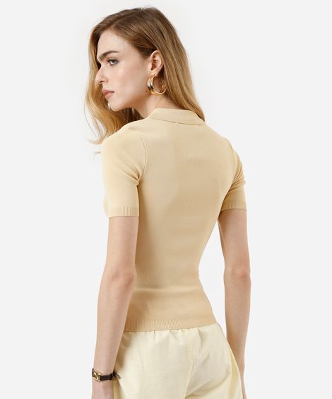 polo feminina de tricot com zíper amarela