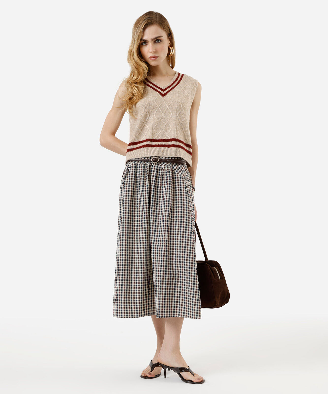 colete feminino de tricot decote v texturizado bege