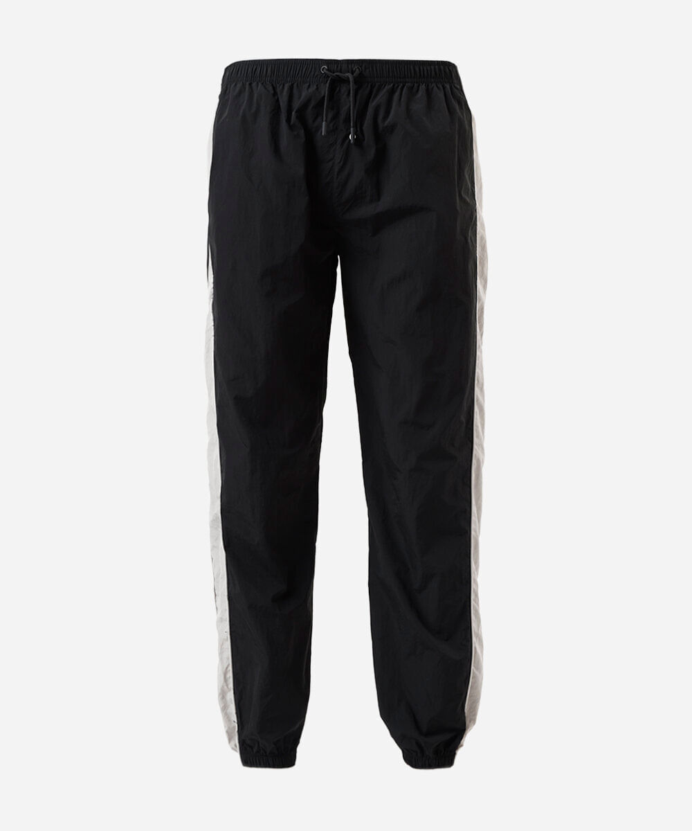 calça jogger juvenil esportiva de poliamida com recortes preta