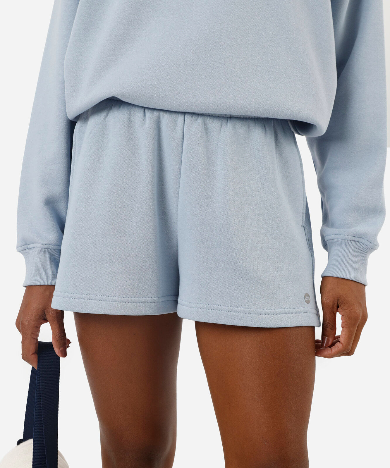 short running feminino de moletom com recorte esportivo azul