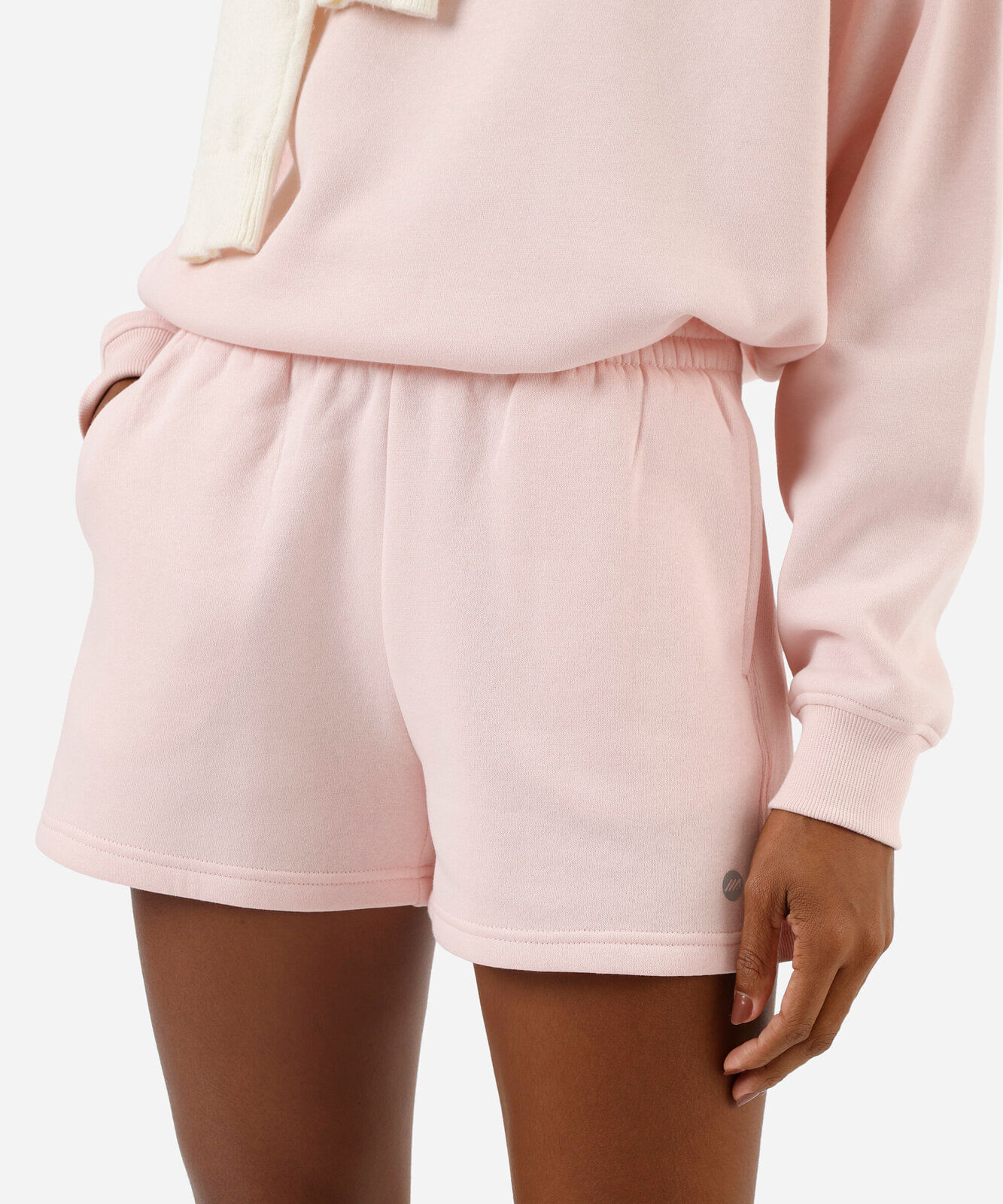 short running feminino de moletom com recorte esportivo rosa