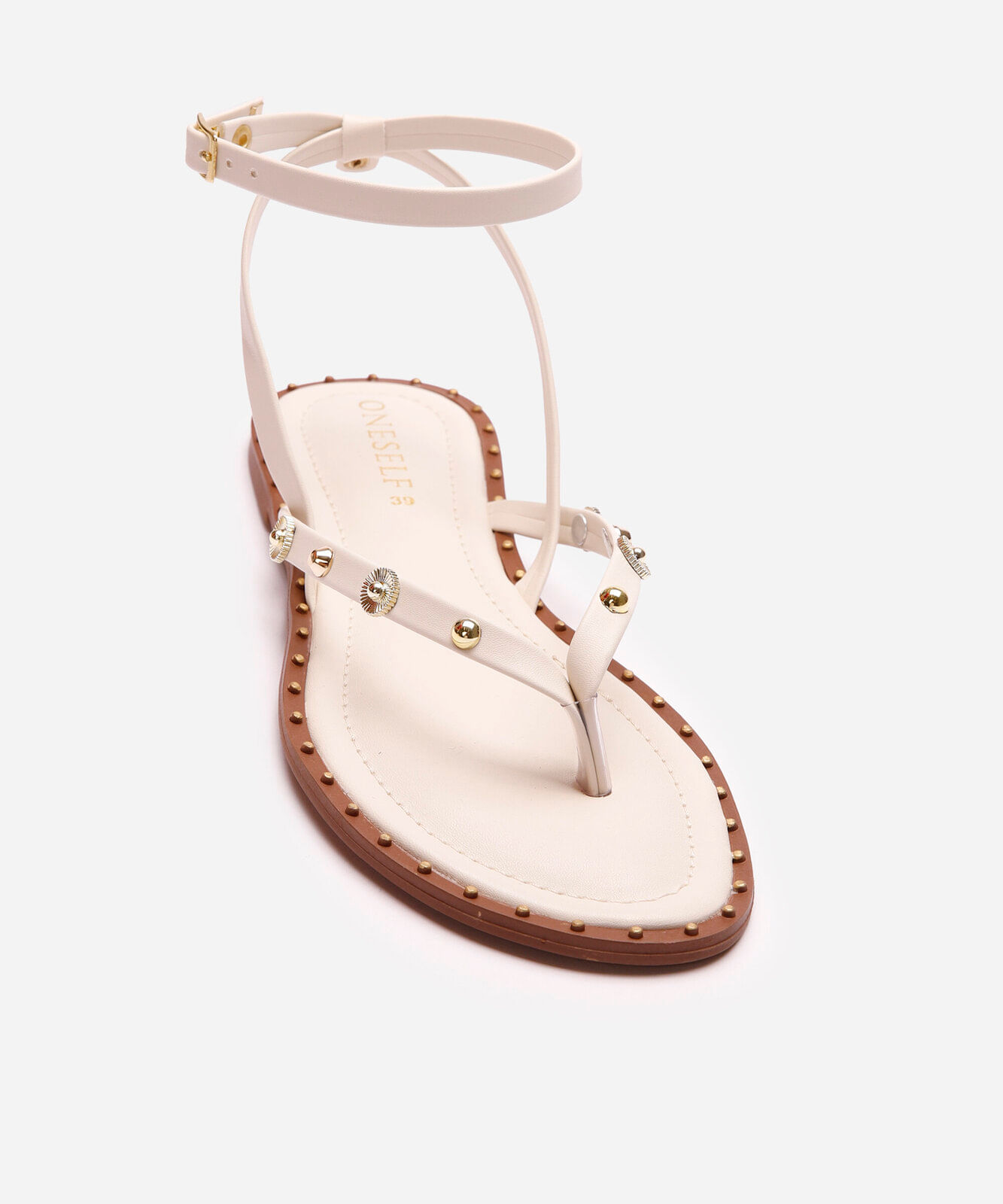 rasteirinha com tachas oneself off white