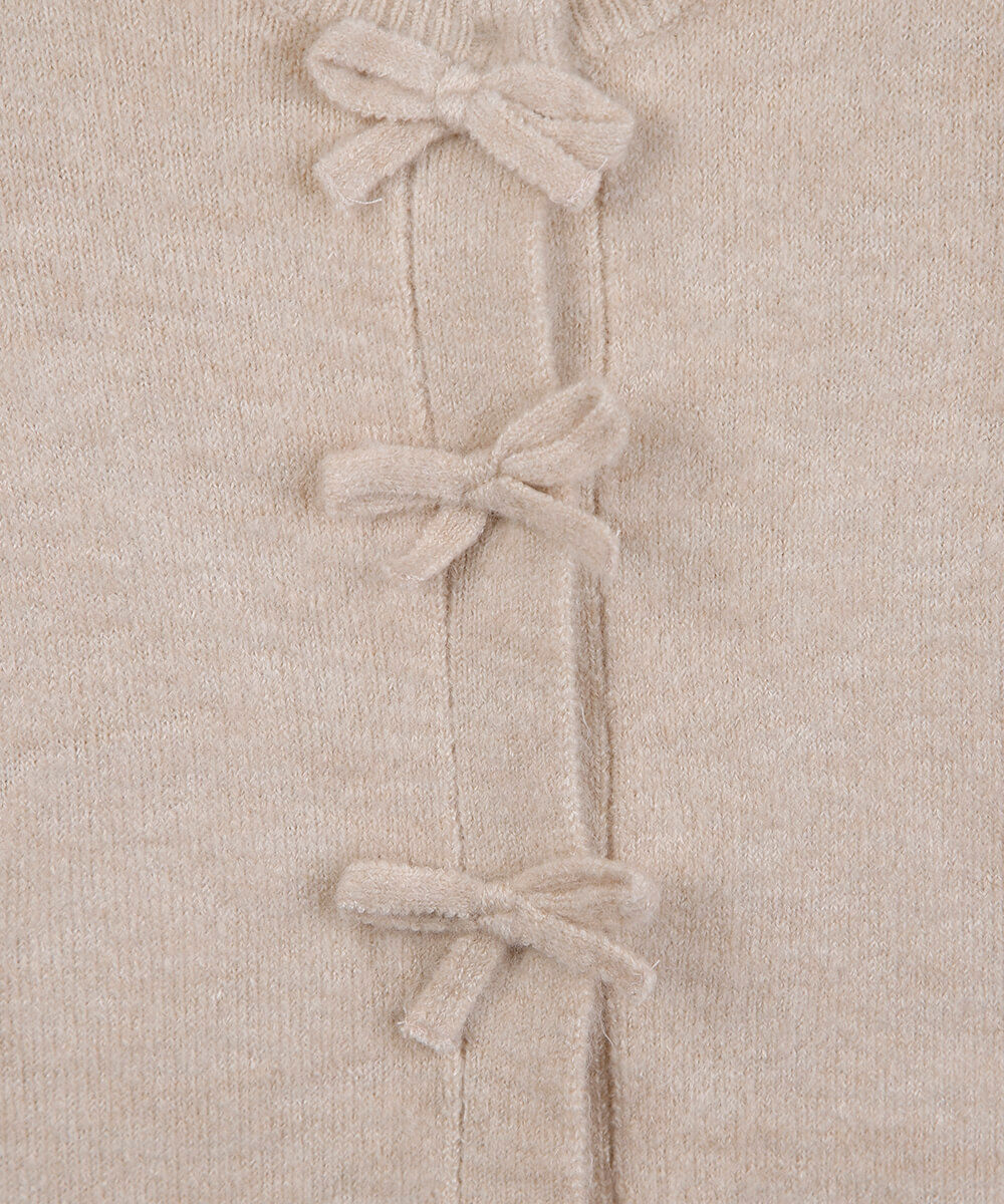 cardigan infantil de tricot com laços bege