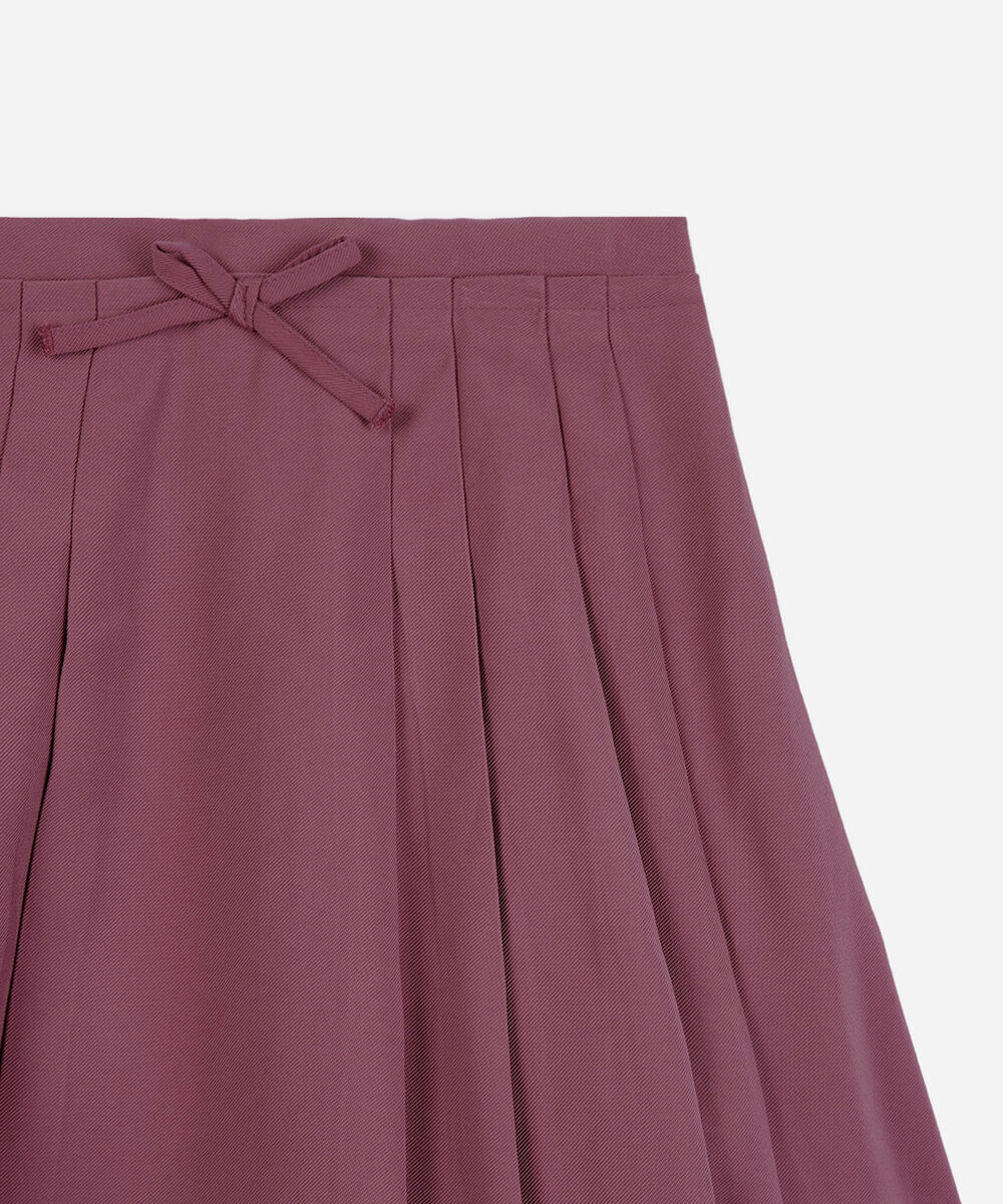 saia infantil plissada de viscose com lacinho roxa