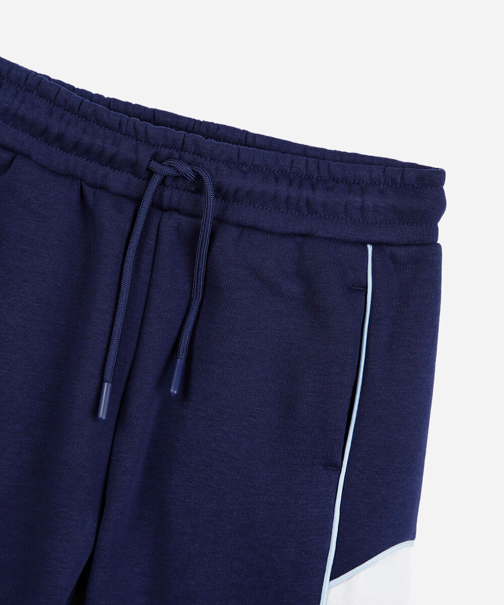 calça jogger infantil de moletom com recortes e nervuras azul- azul médio