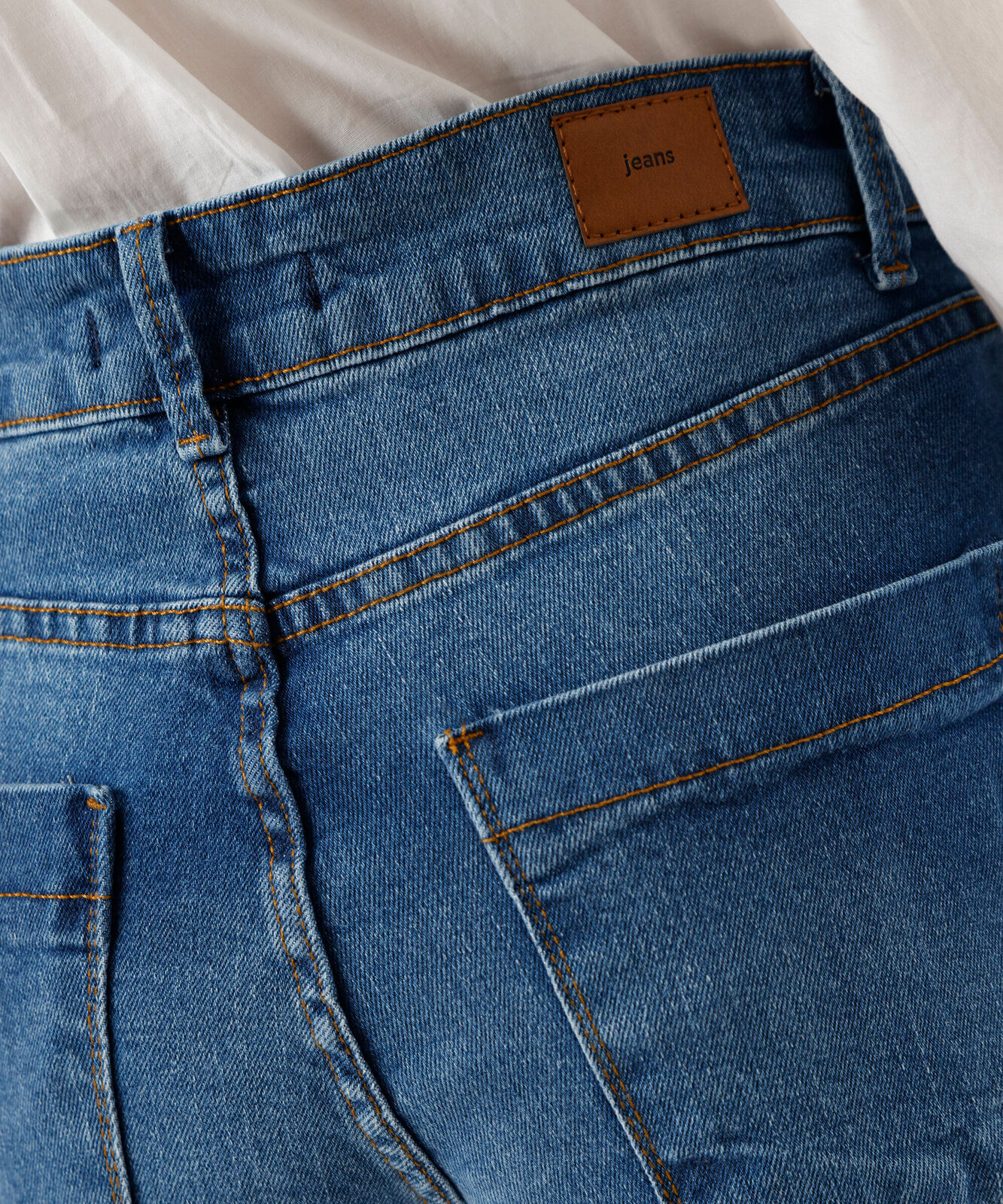 calça skinny feminina jeans com barra a fio cintura alta azul