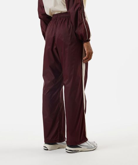 calça feminina de poliamida com recortes e nervuras esportiva vinho