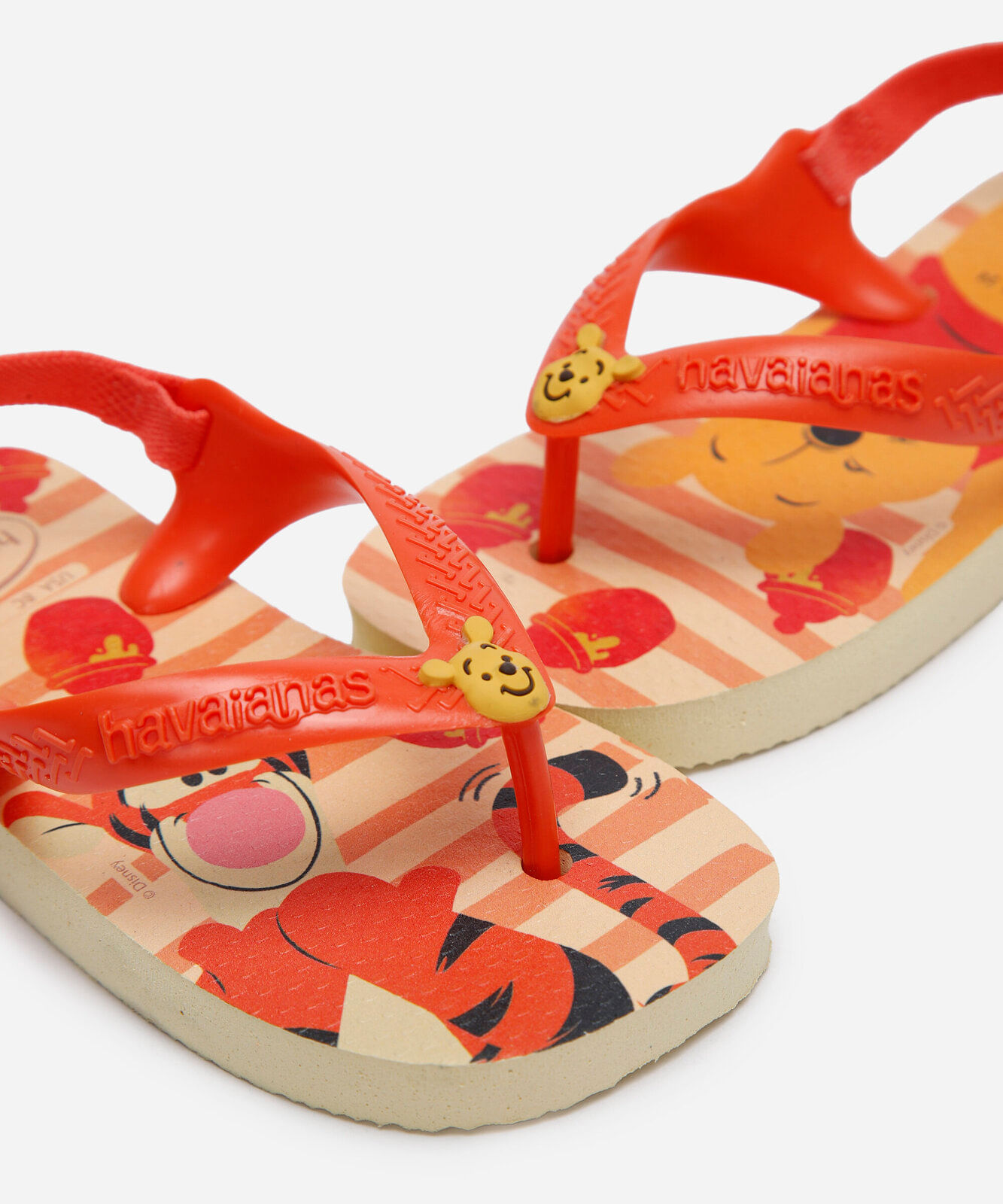 chinelo com elástico infantil havaianas ursinho pooh bege