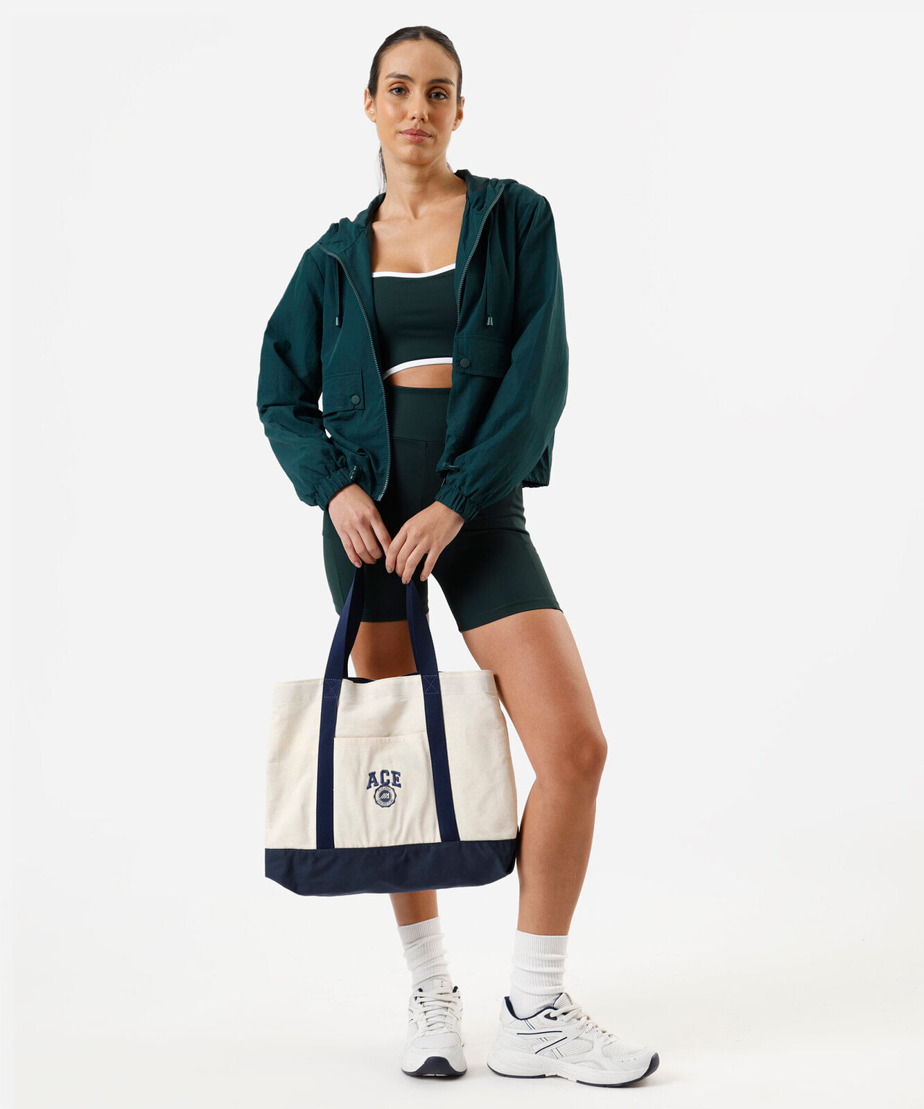 jaqueta corta vento com bolsos verde
