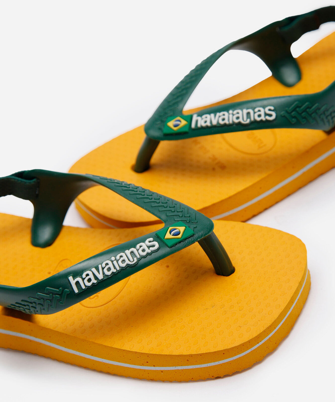 chinelo havaianas infantil com elástico amarelo