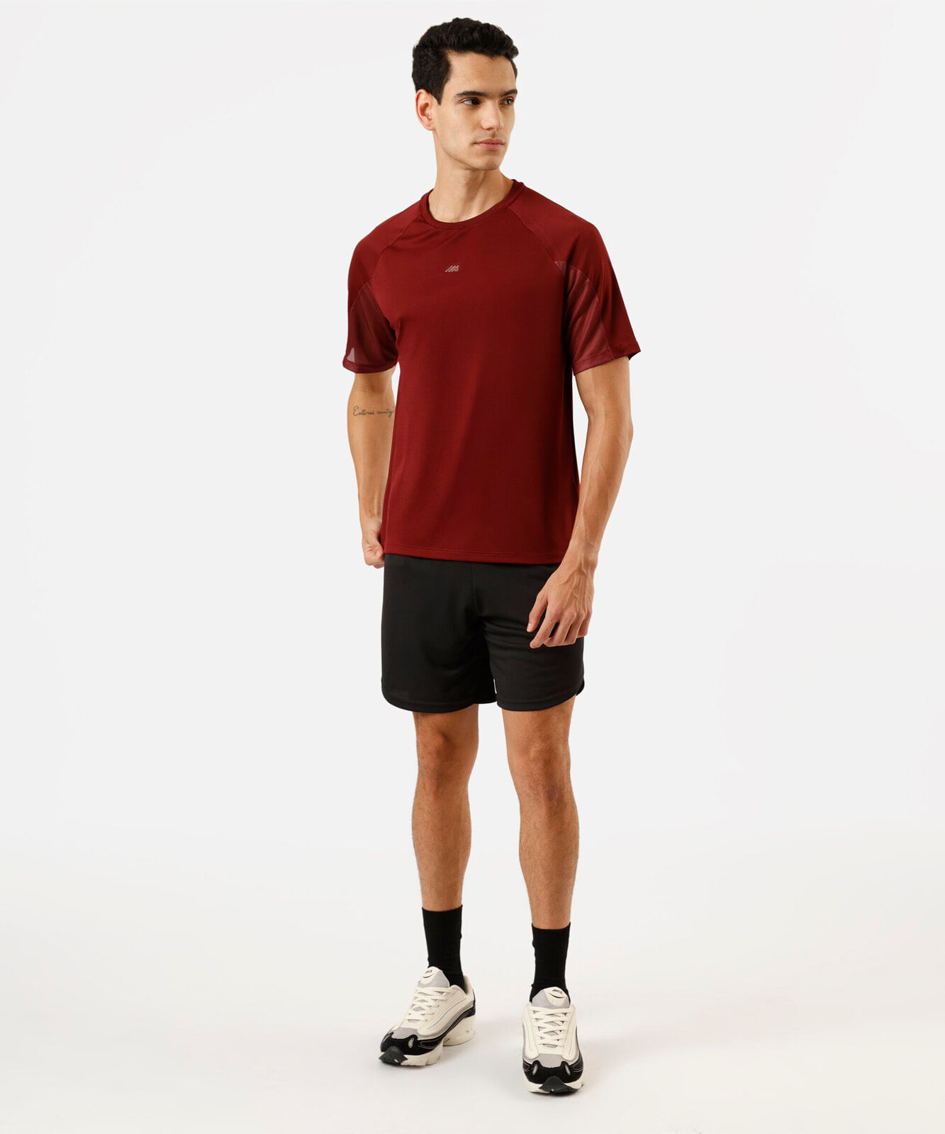 short masculino esportivo texturizado com recorte verde