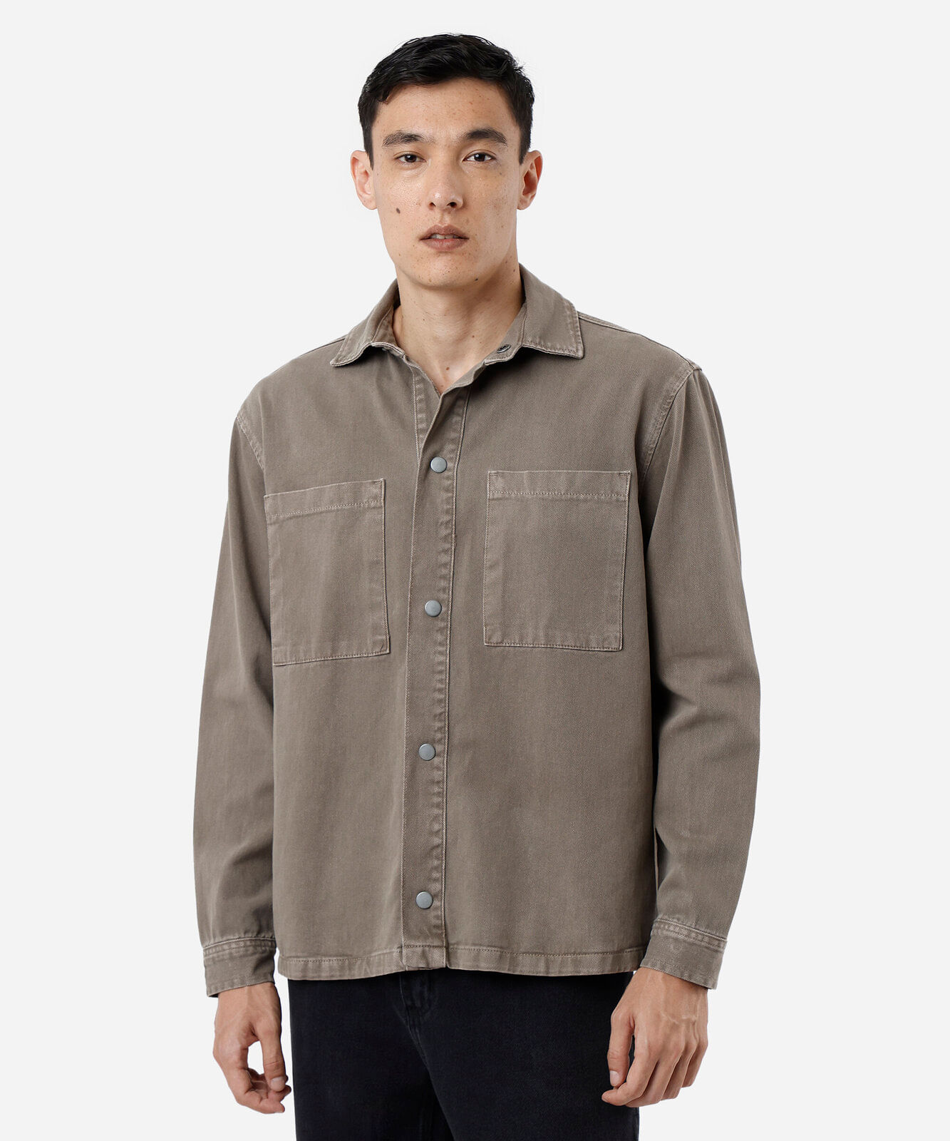 camisa oversized masculina de sarja manga longa estonada marrom