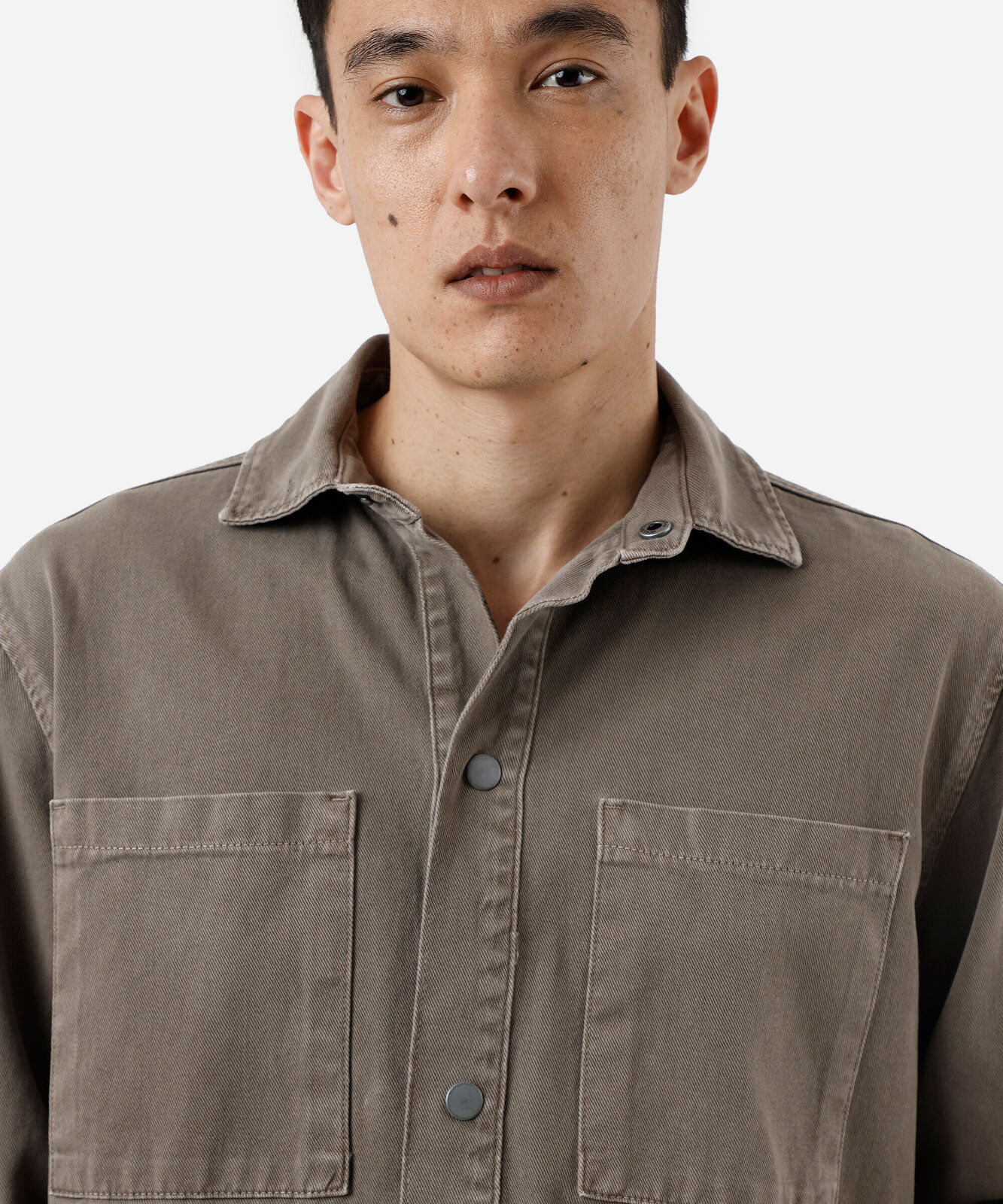 camisa oversized masculina de sarja manga longa estonada marrom