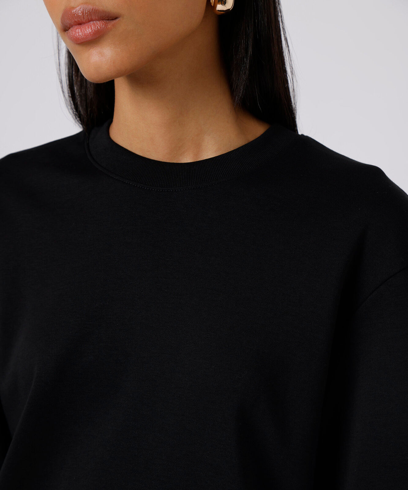 camiseta box fit feminina de algodão peruano mindset preta