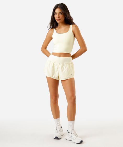 short running com forro e bolso esportivo amarelo