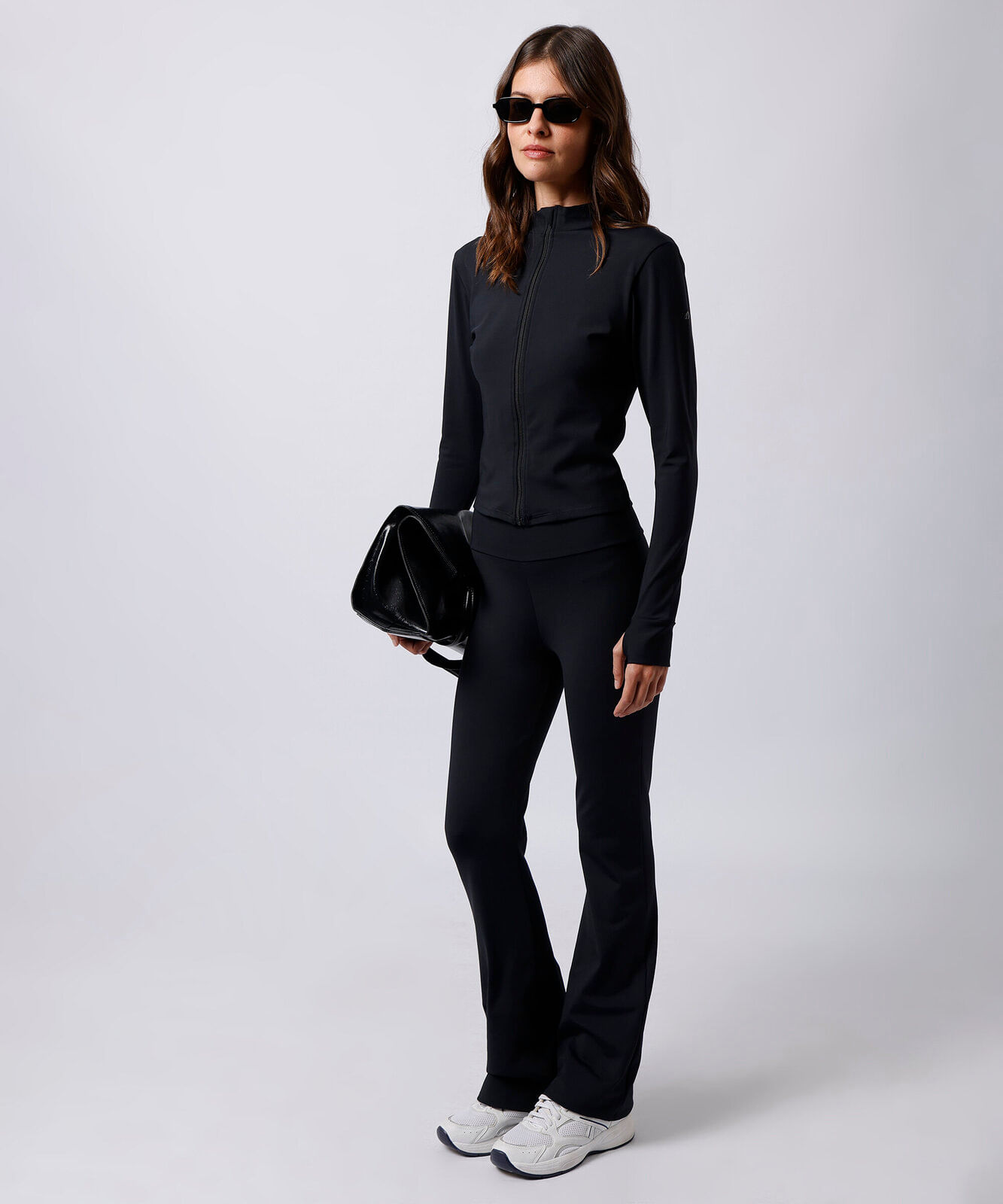 jaqueta feminina de poliamida gola alta mindset sport preta