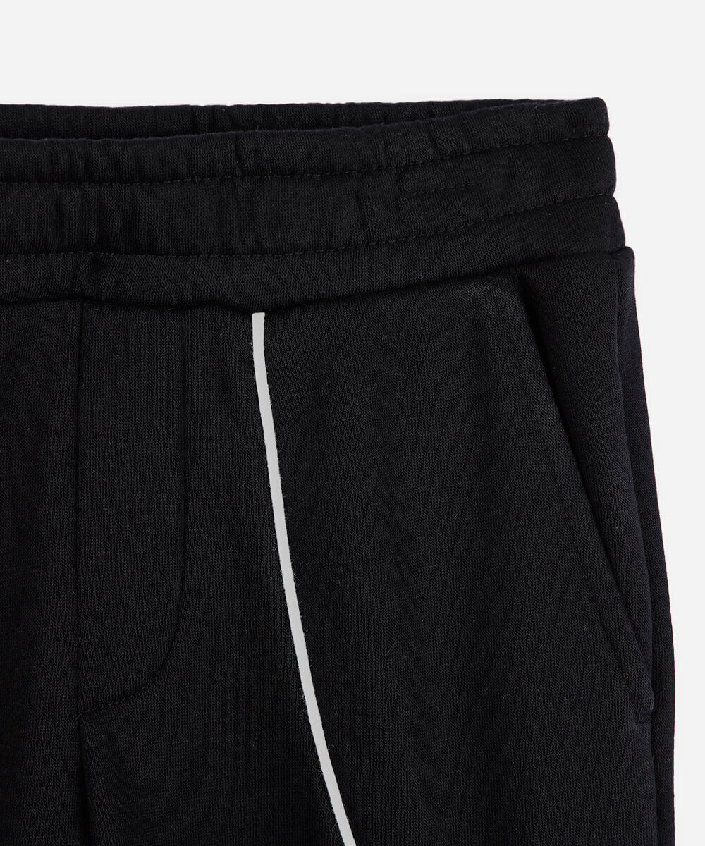 calça jogger infantil de moletom com nervuras preta