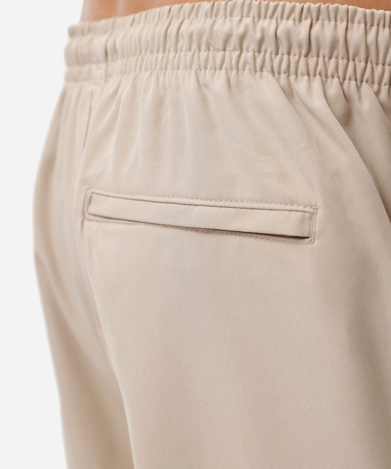 short masculino cós elástico bolso com zíper bege