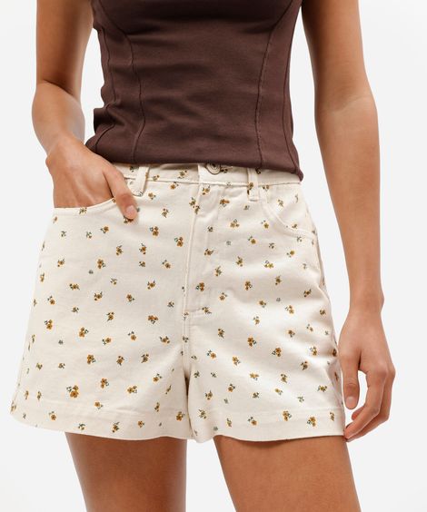 short feminino de sarja cintura super alta com estampa floral liberty bege