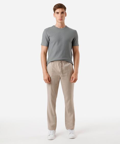 calça jogger de alfaiataria com bolso bege