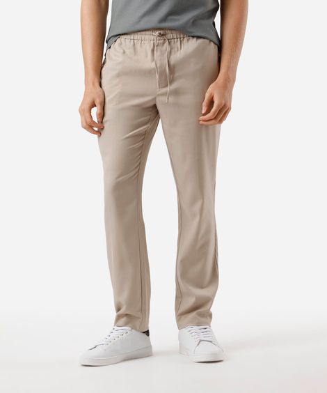 calça jogger de alfaiataria com bolso bege