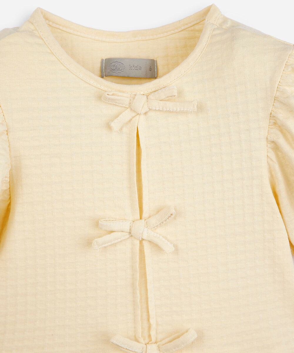 vestido infantil de algodão com recortes e laços manga bufante amarelo