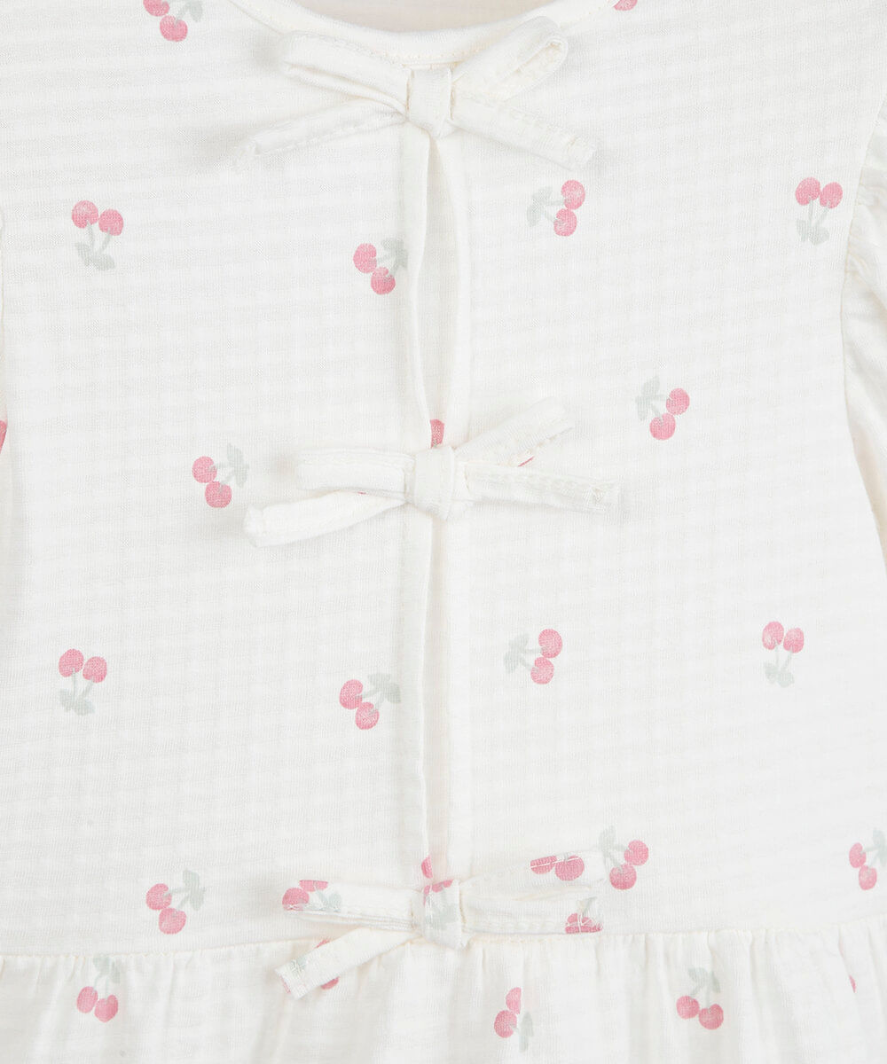 vestido infantil palomino com mangas bufantes em malha anarruga estampado de cereja off white