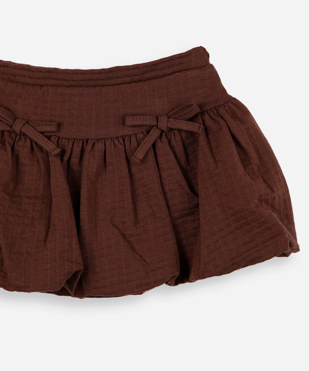 short saia infantil de algodão texturizada com laços marrom