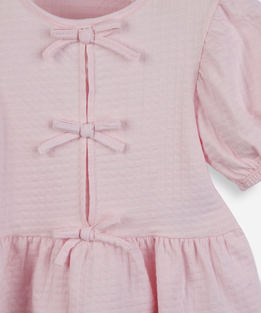 blusa de algodão infantil com lacinho texturizada rosa