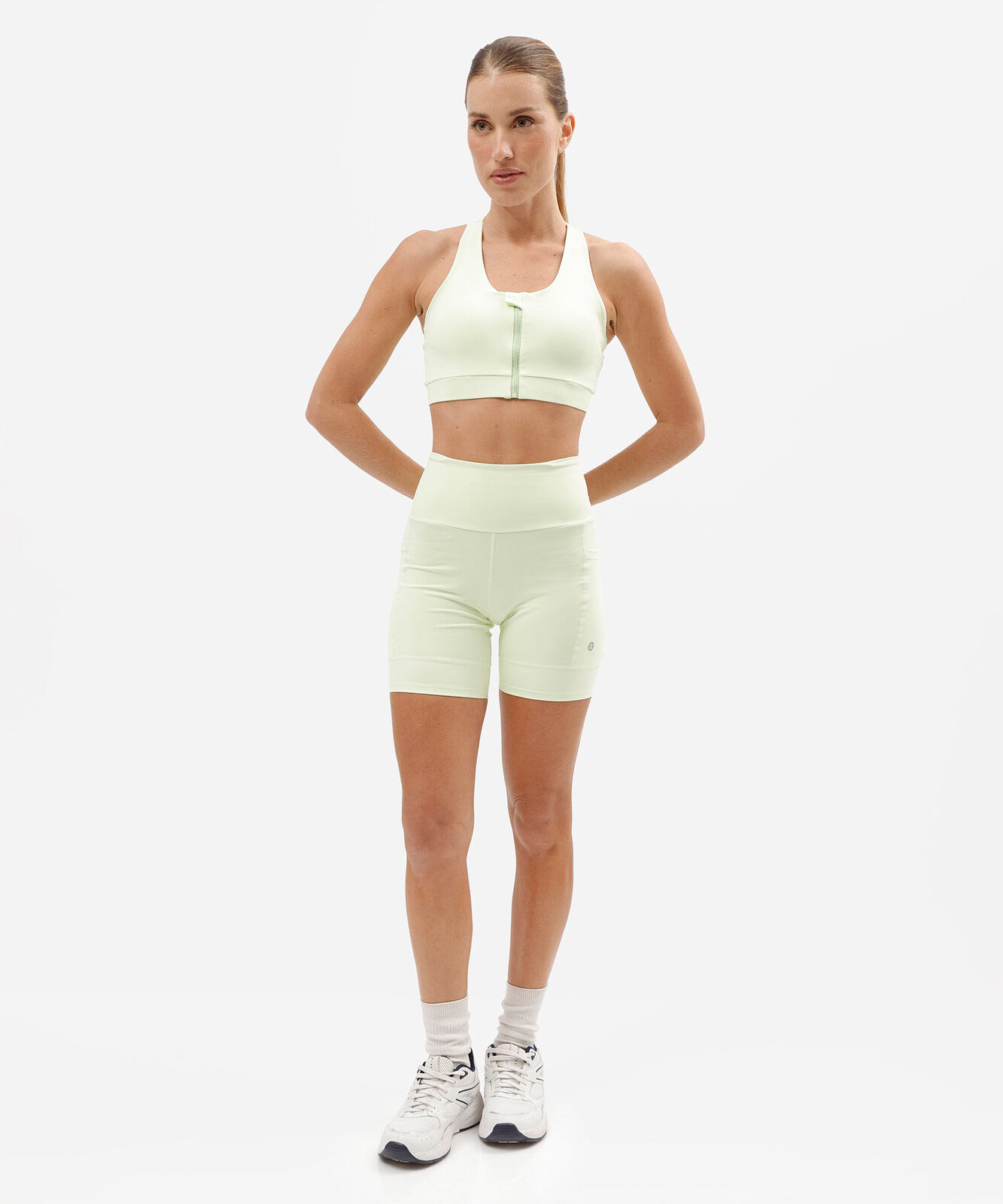 top nadador feminino esportivo com zíper verde