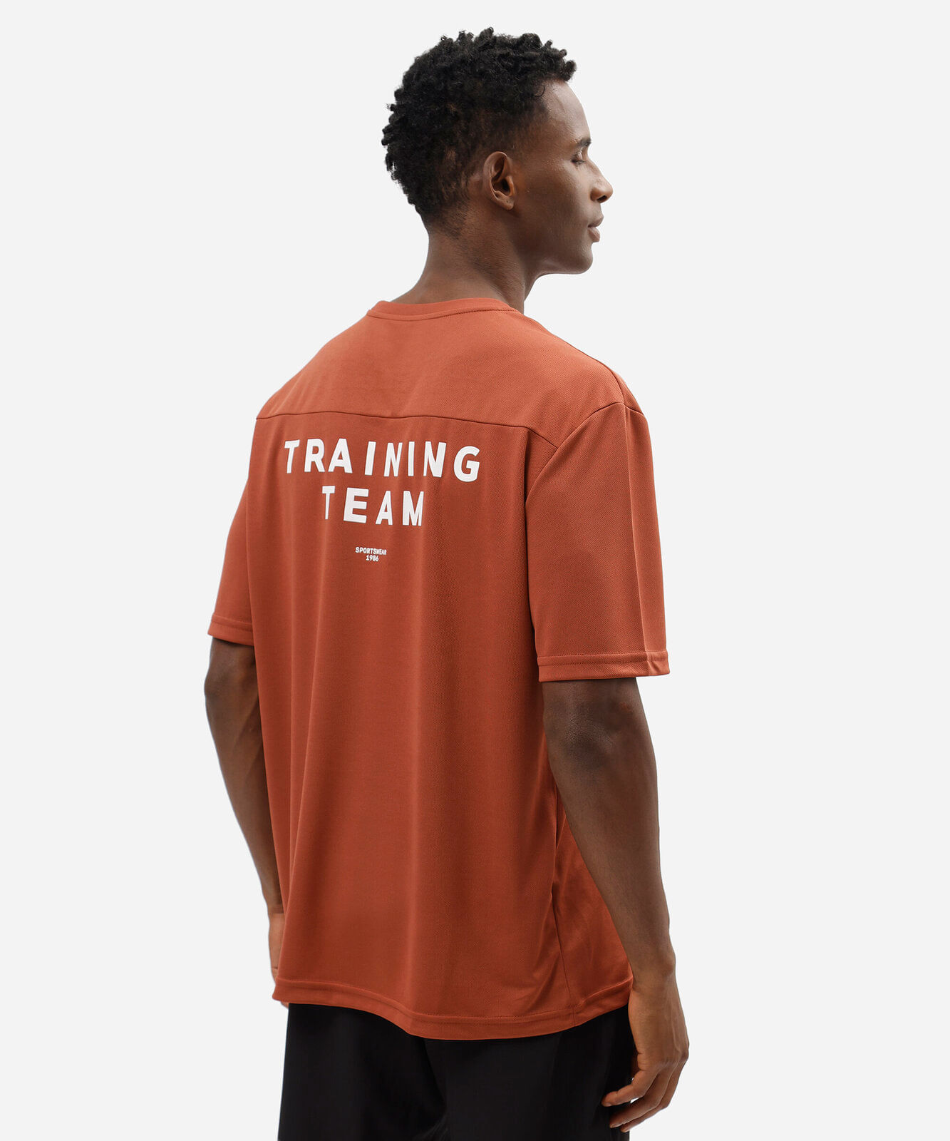 camiseta oversized masculina esportiva estampada laranja