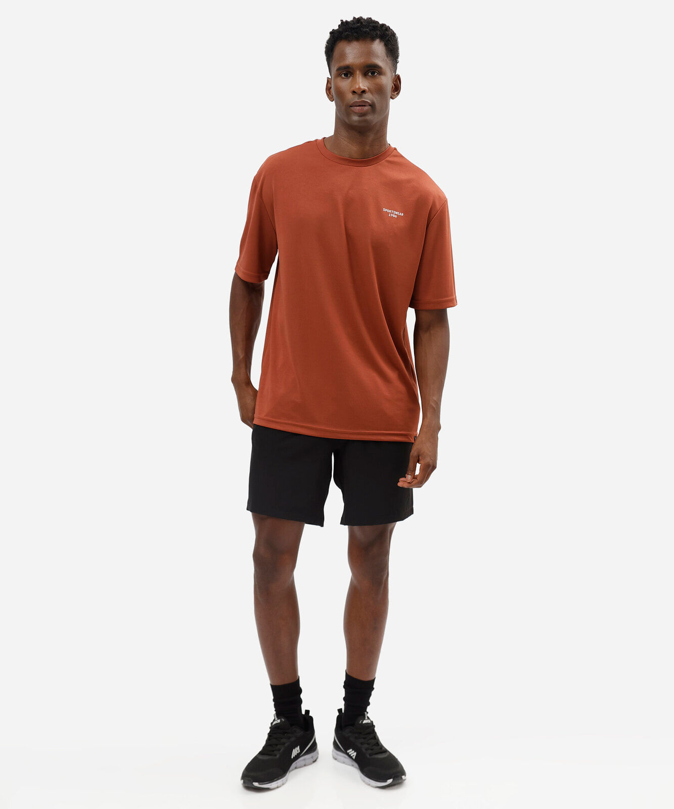 camiseta oversized masculina esportiva estampada laranja