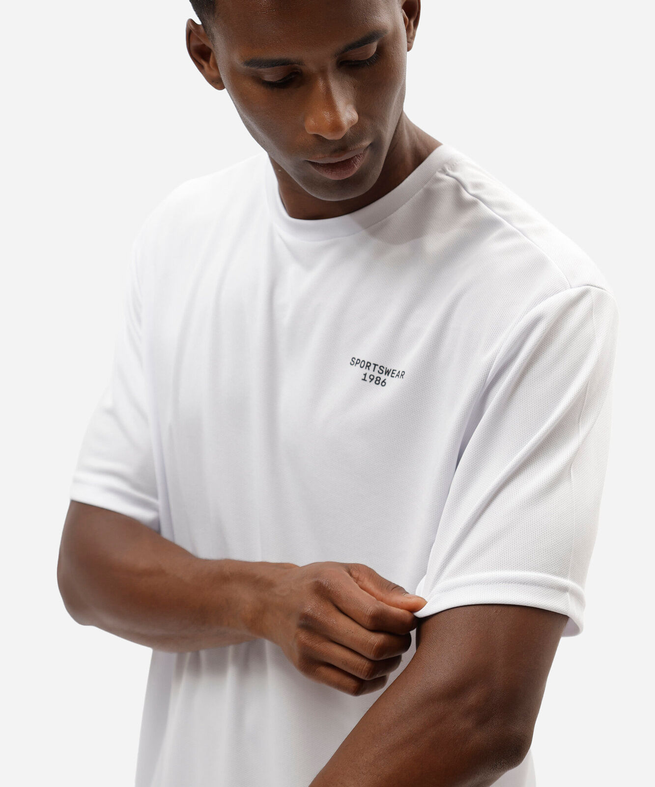 camiseta oversized masculina esportiva estampada branca