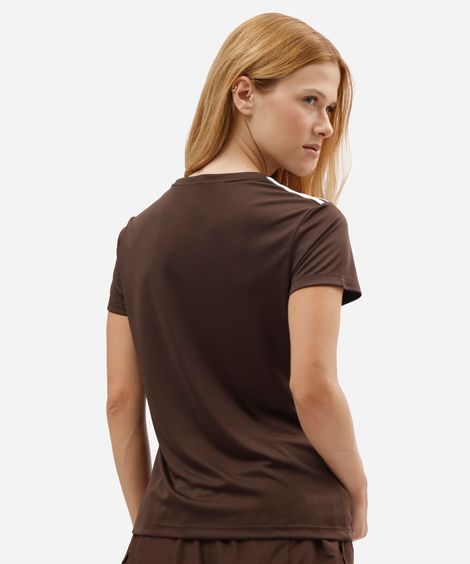 camiseta esportiva feminina de manga curta com recorte no ombro marrom
